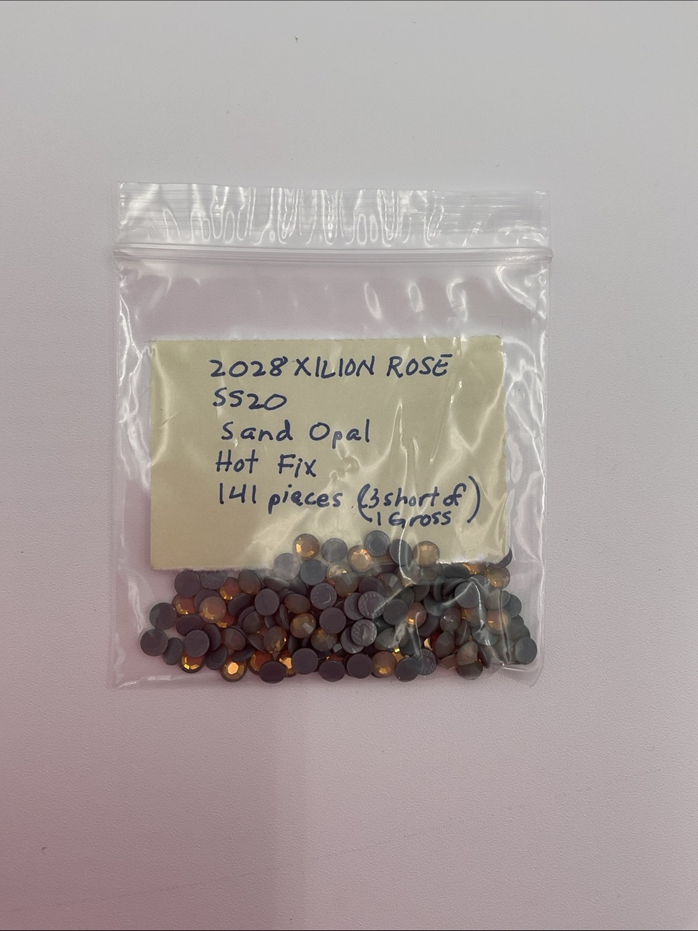 Swarovski • Color: Peridot, 2028 XILION Rose Hotfix Rhinestones